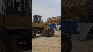 Boomloader shovel filling Sand(rambal)Truck