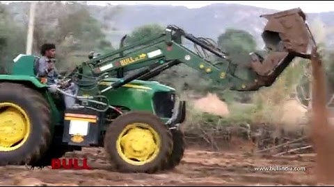 BULL v2 loader with booster bucket on JD 4wd loading and spreading fertilizer to farm land