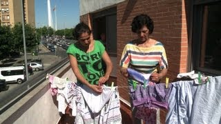 Spain's homeless turn empty apartments into squats