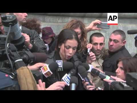Woman at centre of Berlusconi sex trial stages protest outside court