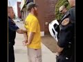 Dummy With A Megaphone Harasses People And Gets Arrested.