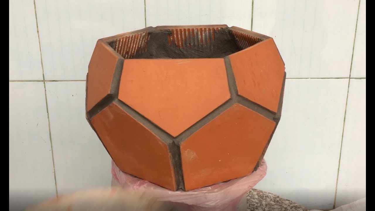 Make beautiful plant pots with ceramic tiles and cement for a small home garden