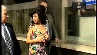 Amy Winehouse court in appearance shows off her TITS
