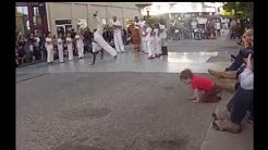 Kids dancing Capoeira.