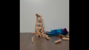 Jenga block tower hit by toy car (reversed, 0.5x)