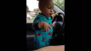 Baby Turns Up Car Radio...HILARIOUS!!!