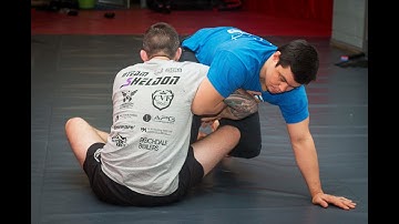 No Gi Jiu Jitsu Tutorial - Using the Kimura roll from standing with Chris Coltrane