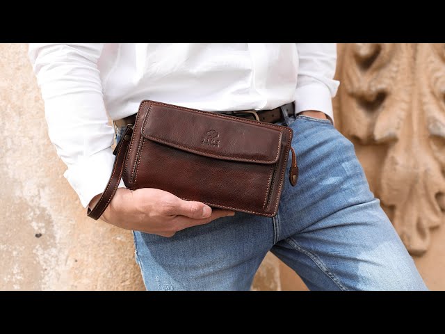Premium Photo | Man hands with purse close up money concept