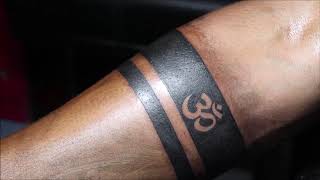 Ohm om trishul 3rd eye mouri pollination band tattoos  Forearm band  tattoos Arm band tattoo Tattoo designs wrist