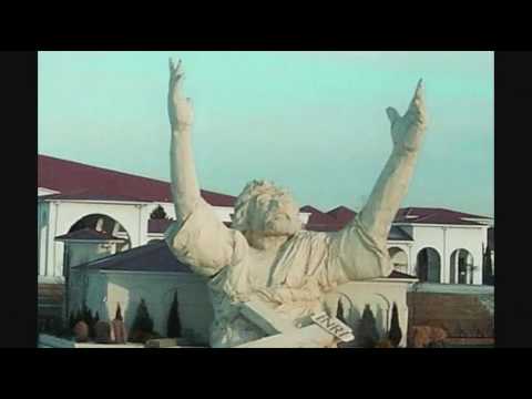 MONROE, Ohio -- A six-story-tall statue of Jesus Christ with his arms raised along a highway was struck by lightning in a thunderstorm Monday night and burned to the ground, police said. The "King of Kings" statue, one of southwest Ohio's most familiar landmarks, had stood since 2004 at the evangelical Solid Rock Church along Interstate 75 in Monroe, just north of Cincinnati. The lightning strike set the statue ablaze around 11:15 pm, Monroe police dispatchers said. The sculpture, 62 feet tall and 40 feet wide at the base, showed Jesus from the torso up and was nicknamed Touchdown Jesus because of the way the arms were raised, similar to a referee signaling a touchdown. It was made of plastic foam and fiberglass over a steel frame, which is all that remained early Tuesday. The fire spread from the statue to an adjacent amphitheater but was confined to the attic area, and no one was injured, police Chief Mark Neu said. The fire department would release a monetary damage estimate Tuesday, he said. Travelers on Interstate 75 often were startled to come upon the huge statue by the roadside, but many said America needs more symbols like it. So many people stopped at the church campus that church officials had to build a walkway to accommodate them. The 4000-member, nondenominational church was founded by former horse trader Lawrence Bishop and his wife. Bishop said in 2004 he was trying to help people, not impress them, with the statue. He said his wife proposed the Jesus <b>...</b>
