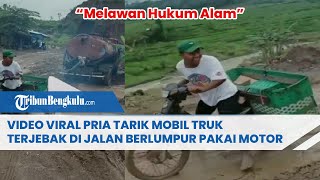 Video Viral Pria Tarik Mobil Truk yang Terjebak di Jalan Berlumpur Pakai Motor: Melawan Hukum Alam