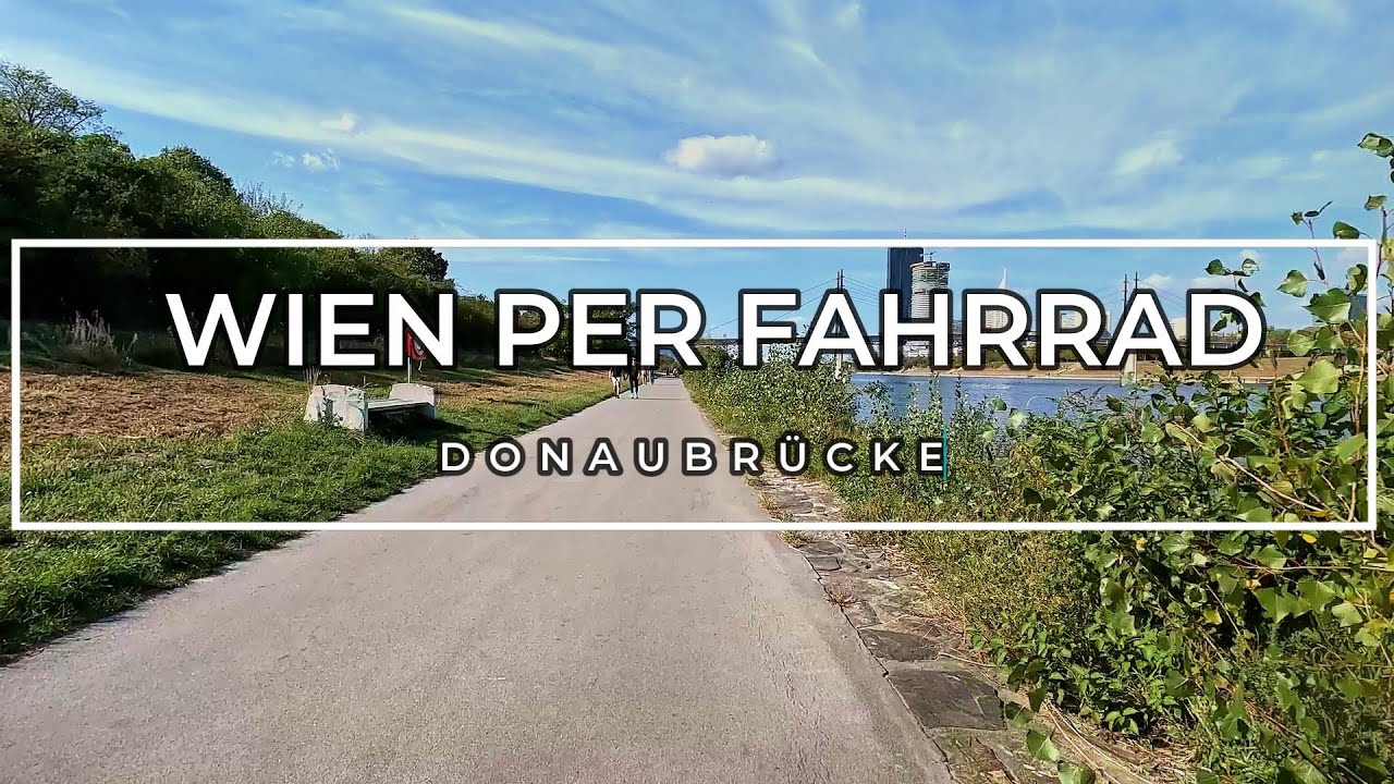 Praterallee zur Donauinsel und zur Schwedenbrücke an einem Sommertag. Wien per Fahrrad