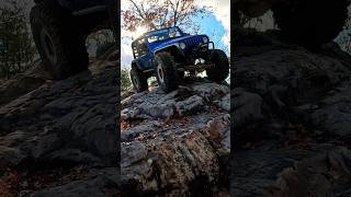 Jeep TJ taking the plunge down on Walden’s Ridge #4x4 #jeep #rockcrawler