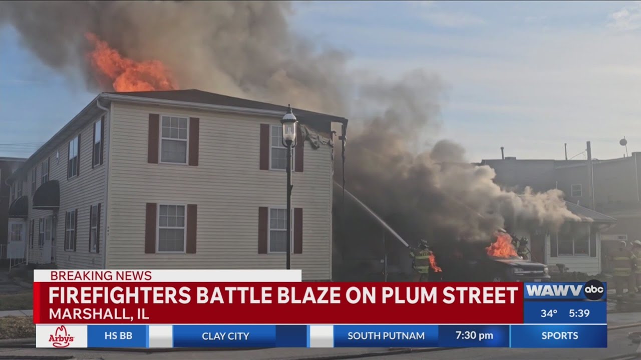 Firefighters battle massive blaze in Marshall - YouTube
