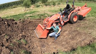 Kubota B2601 and Piranha toothbar digging a trash hole  Bittersweet house flip Part 5