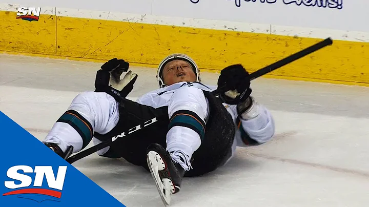 Flames' Sam Bennett Rocks Sharks' Radim Simek With...