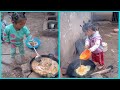 Rural little girl cooking food for family 조리 調理 クック