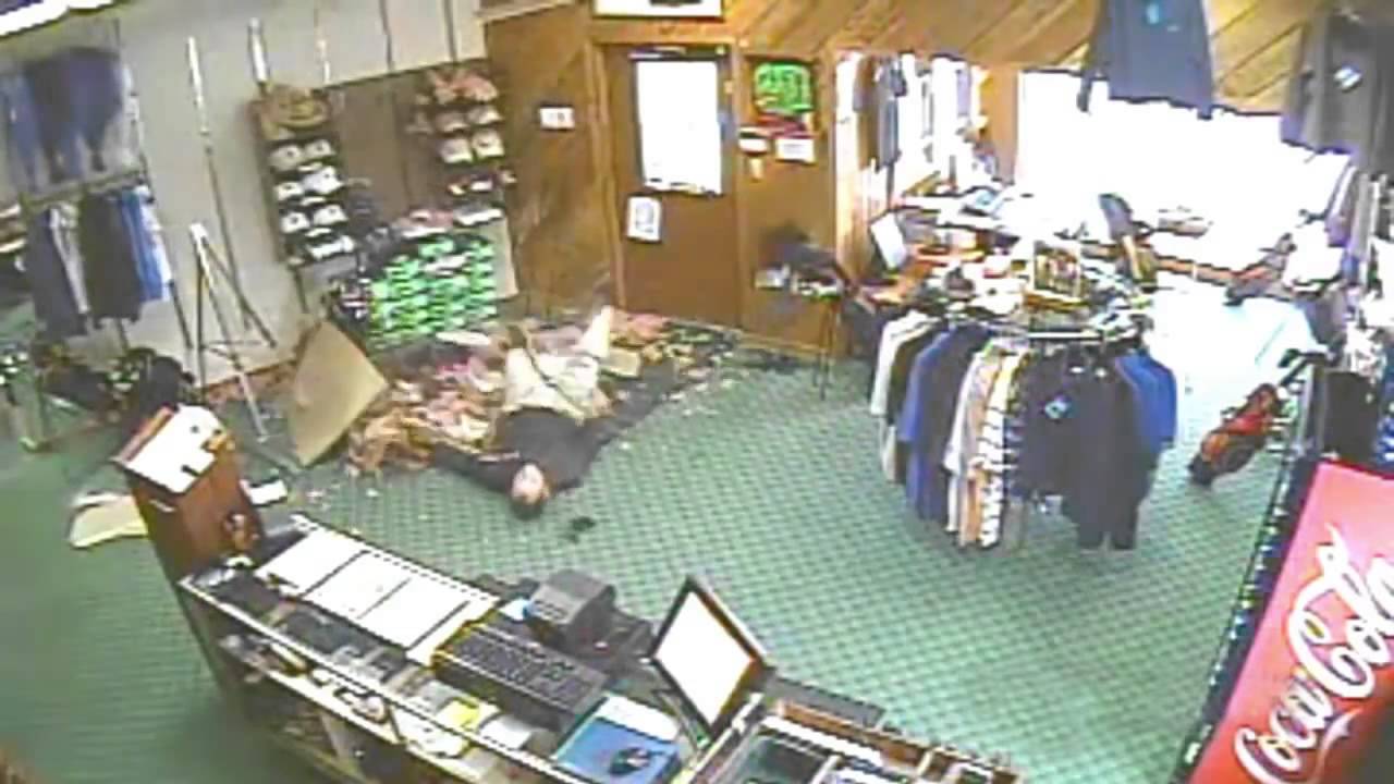 Guy casually falls through the roof