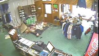 Guy casually falls through the roof