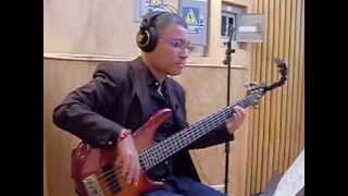 Felipe Pumarada recording bass with Tony Succar