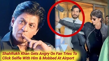 ShahRukh Khan Gets Angry On Fan Tries To Click Selfie With Him & Mobbed At Airport This Morning