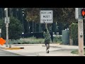 man crosses street like a boss