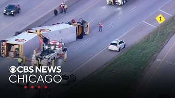 Semi truck rollover crash causing delays on I-80