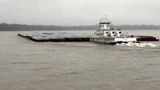 American Heritage with 46 loaded barges southbound