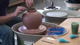 Making a vase on the potters wheel at Northern Beaches Ceramics Sydney Australia