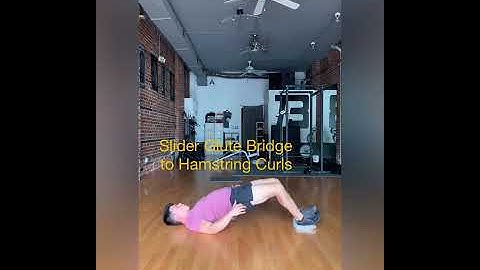 Slider Glute Bridges to Hamstring Curl