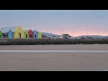 Rhyl, Snowdonia and Llandudno at Sunset from Prestatyn Beach Wales UK