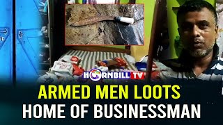 ARMED MEN LOOTS HOME OF BUSINESSMAN