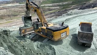 Caterpillar 385C Excavator Loading Caterpillar 775E Dumper And Trucks - Pyramis Ate