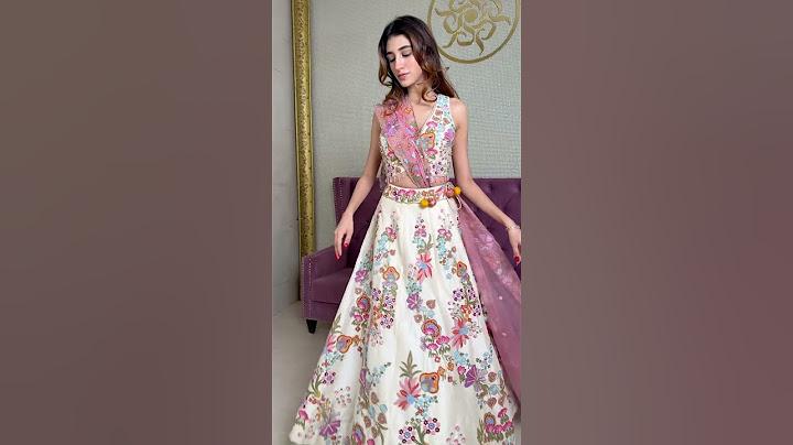White bridal carnival lehengas | Roopkala Heritage