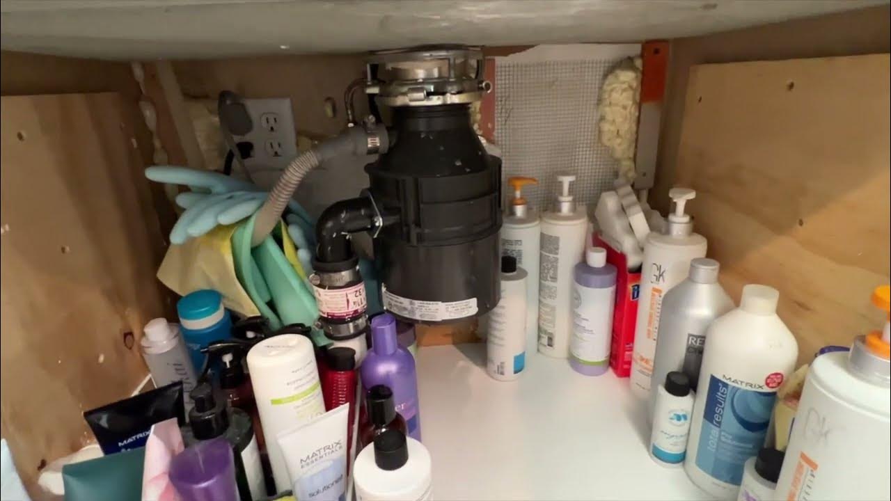 Where is the reset button on my Garbage Disposal? YouTube