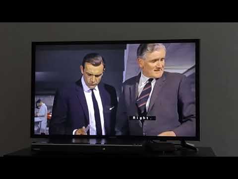 Q Introduces James Bond 007 To His Aston Martin DB5 Scene