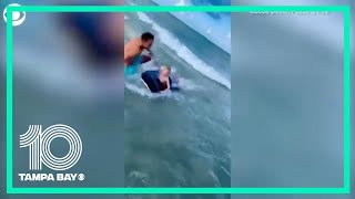 Officer pulls boy away from shark off Florida beach