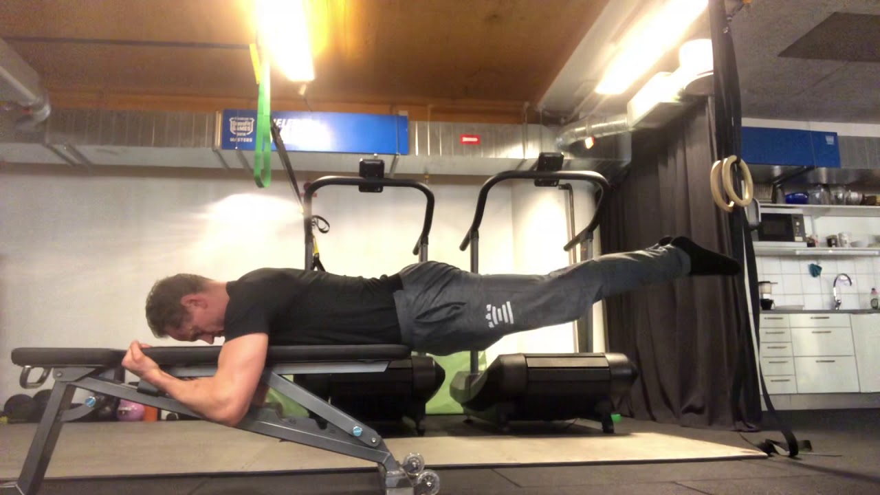 Reverse leg lifts on low bench - YouTube