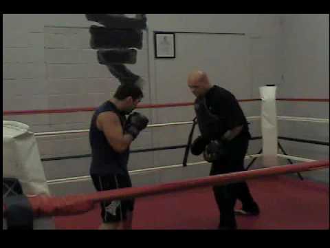 MMA fighter RICH PATISHNOCK with David on the mitts at JSMMA class in Stroudsburg PA