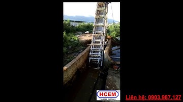 Lắp đặt thiết bị vớt rác tự động cho trại nuôi bò