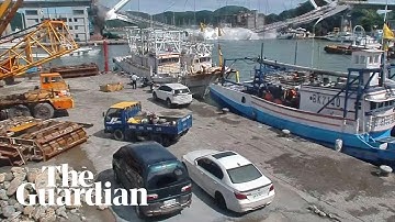 Moment bridge collapses in Taiwan crushing boats and trapping crew