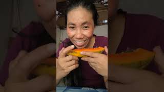 filipina province eating papaya like this