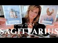 Sagittarius  standing at the crossroads  mid may 2024 zodiac tarot reading