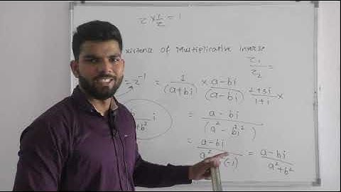 ""Existence of multiplicative inverse  law in multiplication of two complex number