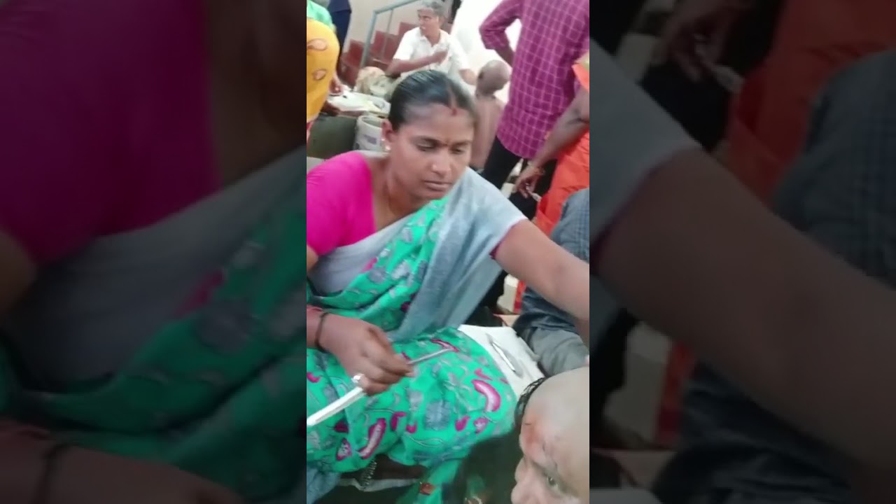 Headshave Beautiful Lady Smiling at Mirror