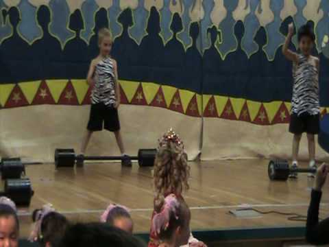 04 09 2009 639pm Brookes Kindergarten Circus lions, strong men w Trent and Brookes wild dancing