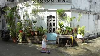 Cutesy 3-year-old girl scoots around Singapores top attractions - SG50