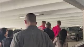 Protesters gather after immigration arrest inside Houston courthouse