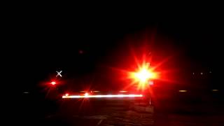 BNSF 7907 leads a stack train west over Indian Trails Road in Barstow
