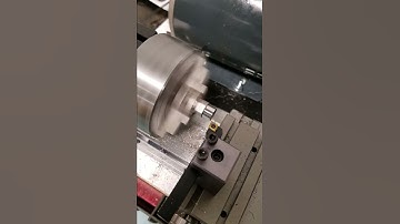Taig Micro Lathe, taking 0.002" of stainless steel.